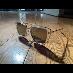 Quay Australia rose gold mirrored sunglasses.